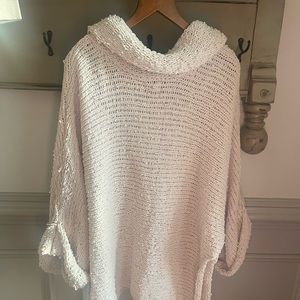 Oversized soft, comfy costal looking sweater. This is a three season sweater!